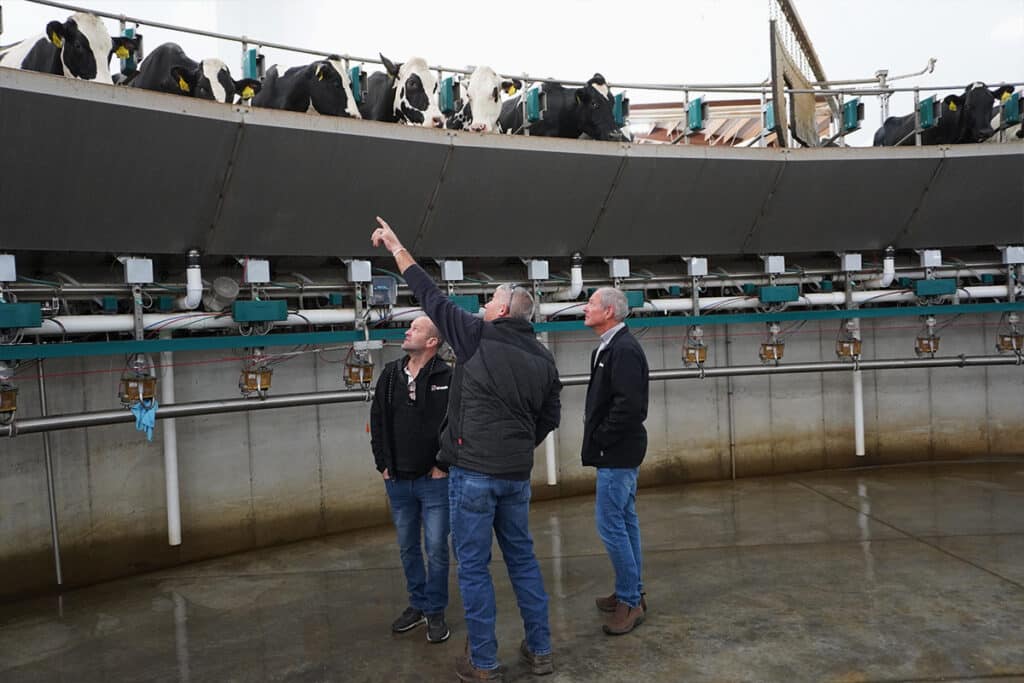 Agromatic team inspecting rotary milking machine design at Abel Dairy Farms.