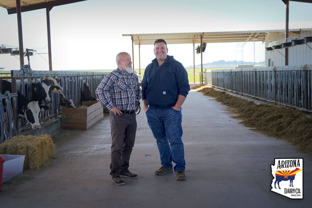 Kurt Loehr of Agromatic sales at the Arizona Dairy Company farm with Justin Stewart (owner).