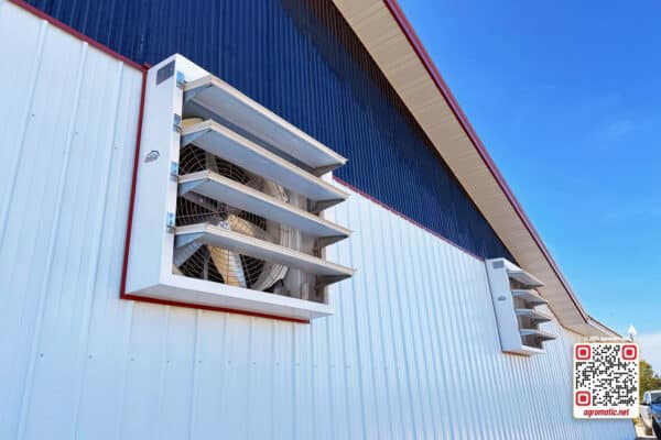 Positive pressure fans in cow barn (outside view).