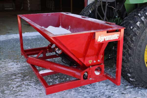 Agromatic's LAG Lime Spreader with lime in bucket.