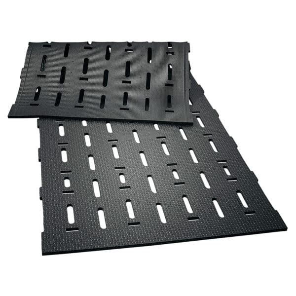 Beef Cattle slat mats: KRAIBURG LOSPA swiss rubber matting with drainage holes.