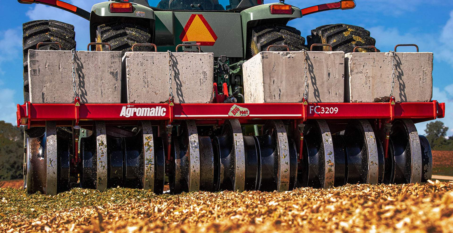 Agromatic Big Foot Silage Packer packing silage.